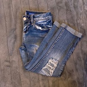 YMI ripped blue skinny jeans.